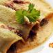 Cannelloni alla catanese ricoperti con uova e caciocavallo grattugiato